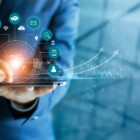 Businessman using tablet analyzing sales data and economic growth graph chart, Technology and icon customer global network connection. Business strategy. Innovative. Digital marketing.
