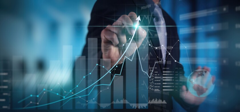 Businessman working with modern computer virtual dashboard analyzing finance sales data and economic growth graph chart and block chain technology.